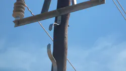 Example of spark gap mounted on wood pole to protect pole from damage to lightning flashover and resultant power frequency follow current. Example of spark gap mounted on wood pole to protect pole from damage to lightning flashover and resultant power frequency follow current.
