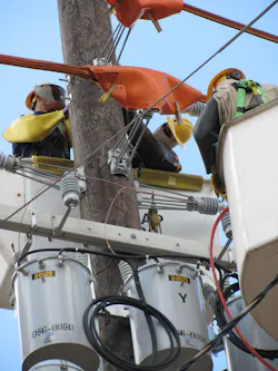 Hawaiian Electric crews work on a pole-mounted transformer. The utility has seen lead times jump from 16 weeks to 142 weeks for single-phase pad-mounted transformers. Hawaiian Electric crews work on a pole-mounted transformer. The utility has seen lead times jump from 16 weeks to 142 weeks for single-phase pad-mounted transformers.