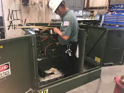 An Emerald Transformer technician repairs a transformer. Emerald is building a facility in Waco, Texas to respond to the new demand for transformer services. An Emerald Transformer technician repairs a transformer. Emerald is building a facility in Waco, Texas to respond to the new demand for transformer services.