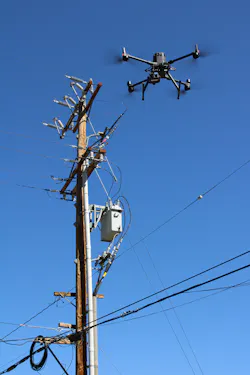 A drone conducts a comprehensive asset inspection on distribution lines and equipment. A drone conducts a comprehensive asset inspection on distribution lines and equipment.