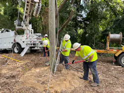 JOEMC workers put a utility pole into place. The co-op employs 183 people, about 90 of whom account for outside line workers who handle a myriad of tasks, including vegetation management and line construction and maintenance. JOEMC workers put a utility pole into place. The co-op employs 183 people, about 90 of whom account for outside line workers who handle a myriad of tasks, including vegetation management and line construction and maintenance.