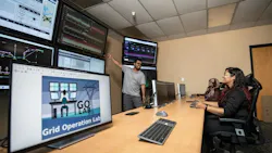 WVU Lane Department of Computer Science and Electrical Engineering students Partha Sarker, Paroma Chatterjee and Jannatul Adan, discuss a power grid simulation project led by Anurag Srivastava, professor and department chair, in the GOLab. WVU Lane Department of Computer Science and Electrical Engineering students Partha Sarker, Paroma Chatterjee and Jannatul Adan, discuss a power grid simulation project led by Anurag Srivastava, professor and department chair, in the GOLab.