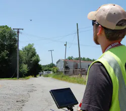 Entergy Engineer Aaron Scruggs wraps up flying a distribution line. He uses video and photos taken with drone to identify trouble spots on equipment. Entergy Engineer Aaron Scruggs wraps up flying a distribution line. He uses video and photos taken with drone to identify trouble spots on equipment.