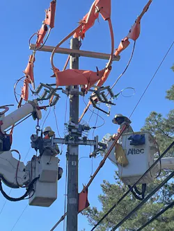 High service reliability in 2023 was driven, in large part, by the continued installation of smart, automated devices throughout the power grid. Last year alone, Georgia Power crews installed more than 1,000 automated devices across the state, which can be controlled remotely. Here, crews install a smart recloser device in Savannah, which helps prevent power outages, and when interruptions occur, they can help restore power faster. High service reliability in 2023 was driven, in large part, by the continued installation of smart, automated devices throughout the power grid. Last year alone, Georgia Power crews installed more than 1,000 automated devices across the state, which can be controlled remotely. Here, crews install a smart recloser device in Savannah, which helps prevent power outages, and when interruptions occur, they can help restore power faster.