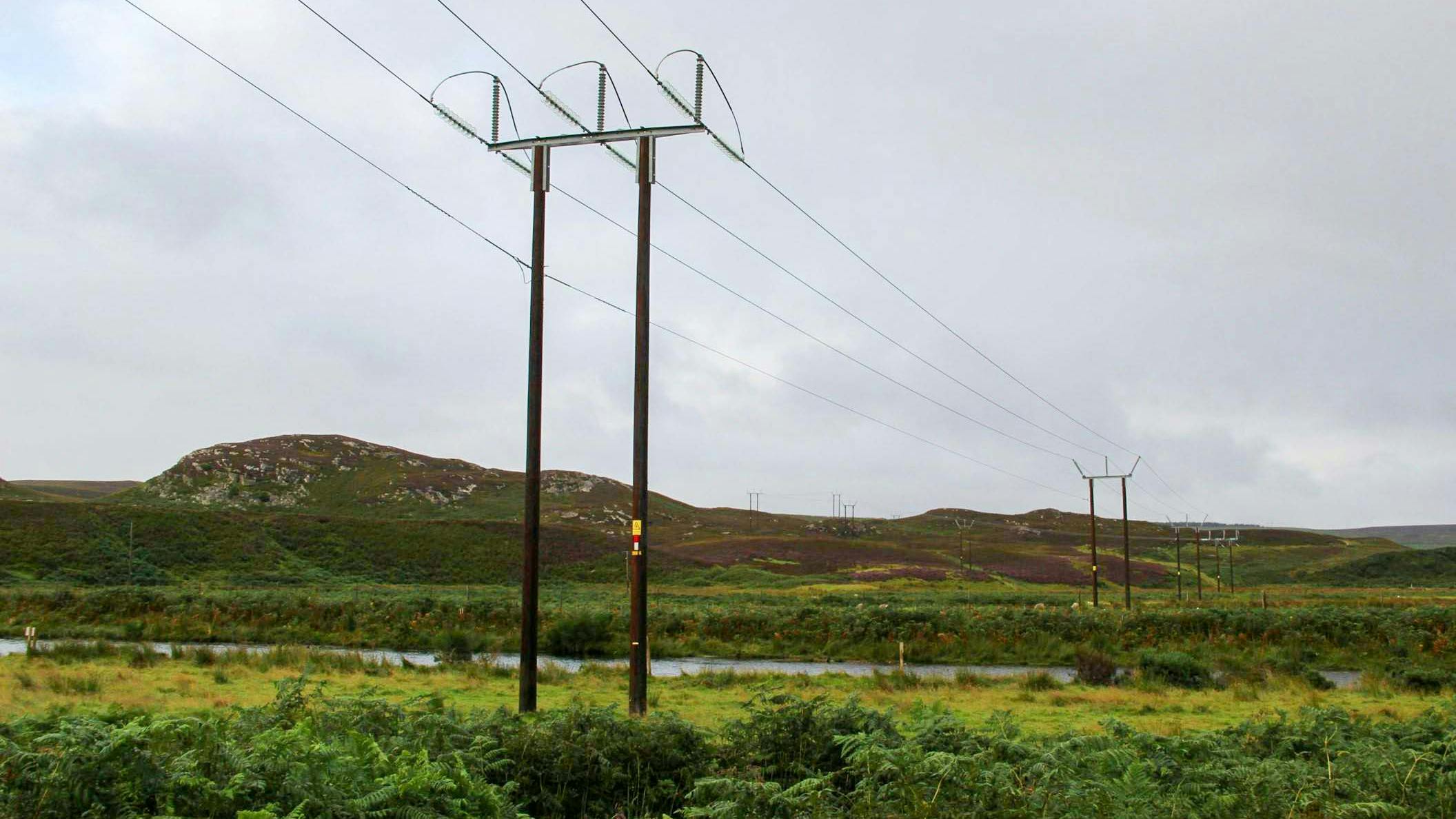 Transmission lines connecting the Isle of Skye with mainland Scotland. SSEN Transmission plans to install bird diverters using robots and drones at this power connection.
