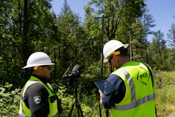 Jason Buce, a construction project manager with PGE (left) and Bodhi Long, a quality control inspector with PGE (right), conduct powerline inspections in support of PGE’s wildfire mitigation efforts in the Mt. Hood National Forest near Zigzag, Ore. PGE’s service area includes more than 2.2 million trees and approximately 12,000 miles of overhead power lines. PGE and Asplundh crews conduct routine, year-round tree-trimming and vegetation management. Jason Buce, a construction project manager with PGE (left) and Bodhi Long, a quality control inspector with PGE (right), conduct powerline inspections in support of PGE’s wildfire mitigation efforts in the Mt. Hood National Forest near Zigzag, Ore. PGE’s service area includes more than 2.2 million trees and approximately 12,000 miles of overhead power lines. PGE and Asplundh crews conduct routine, year-round tree-trimming and vegetation management.