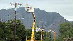 Hawaiian Electric crews replace older power lines with aluminum cabling along Hakimo Road in Waiʻanae, an initiative under its Wildfire Safety Strategy. Hawaiian Electric crews replace older power lines with aluminum cabling along Hakimo Road in Waiʻanae, an initiative under its Wildfire Safety Strategy.