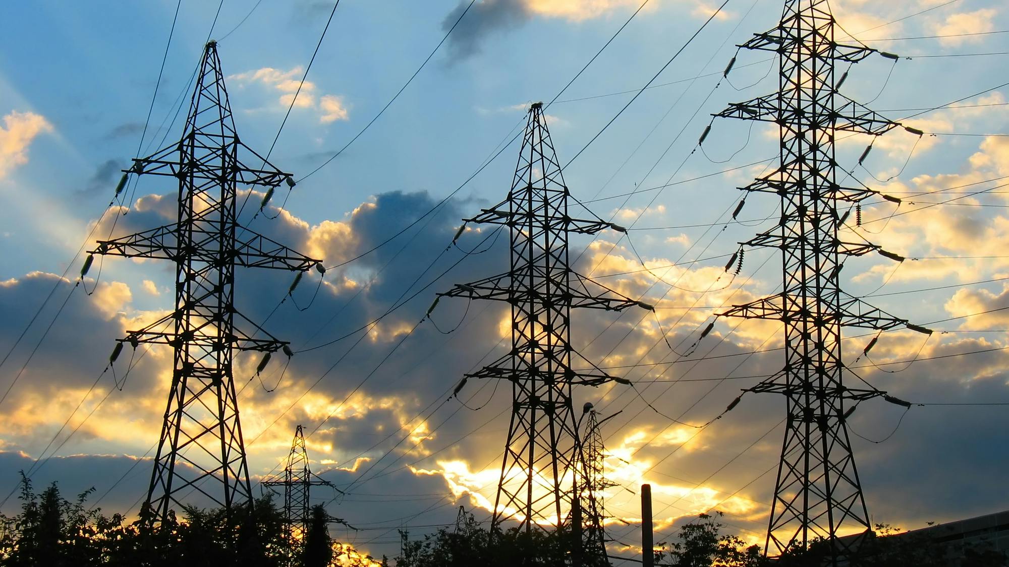 transmission lines at sunset