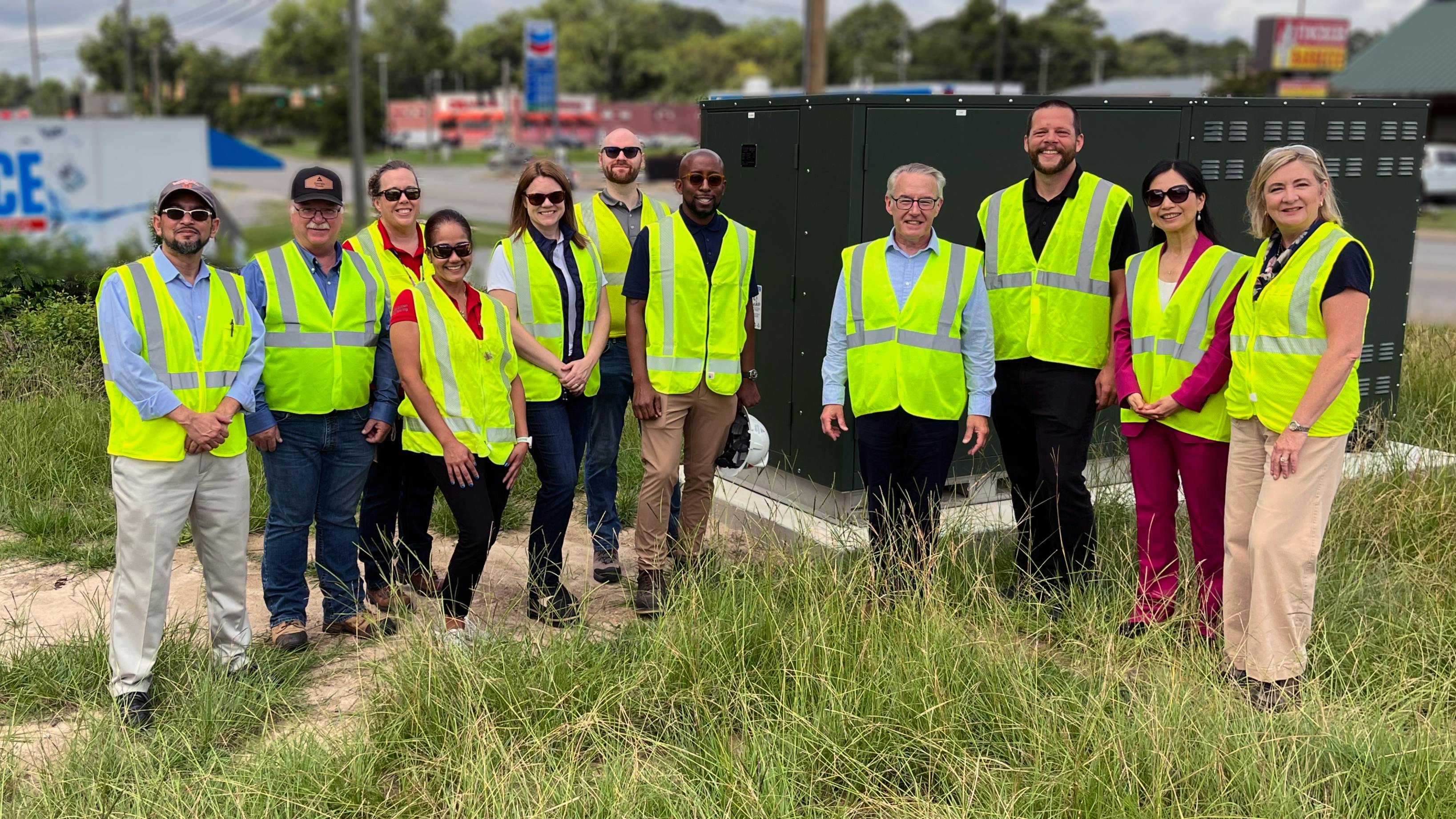 utility and project partners visit site