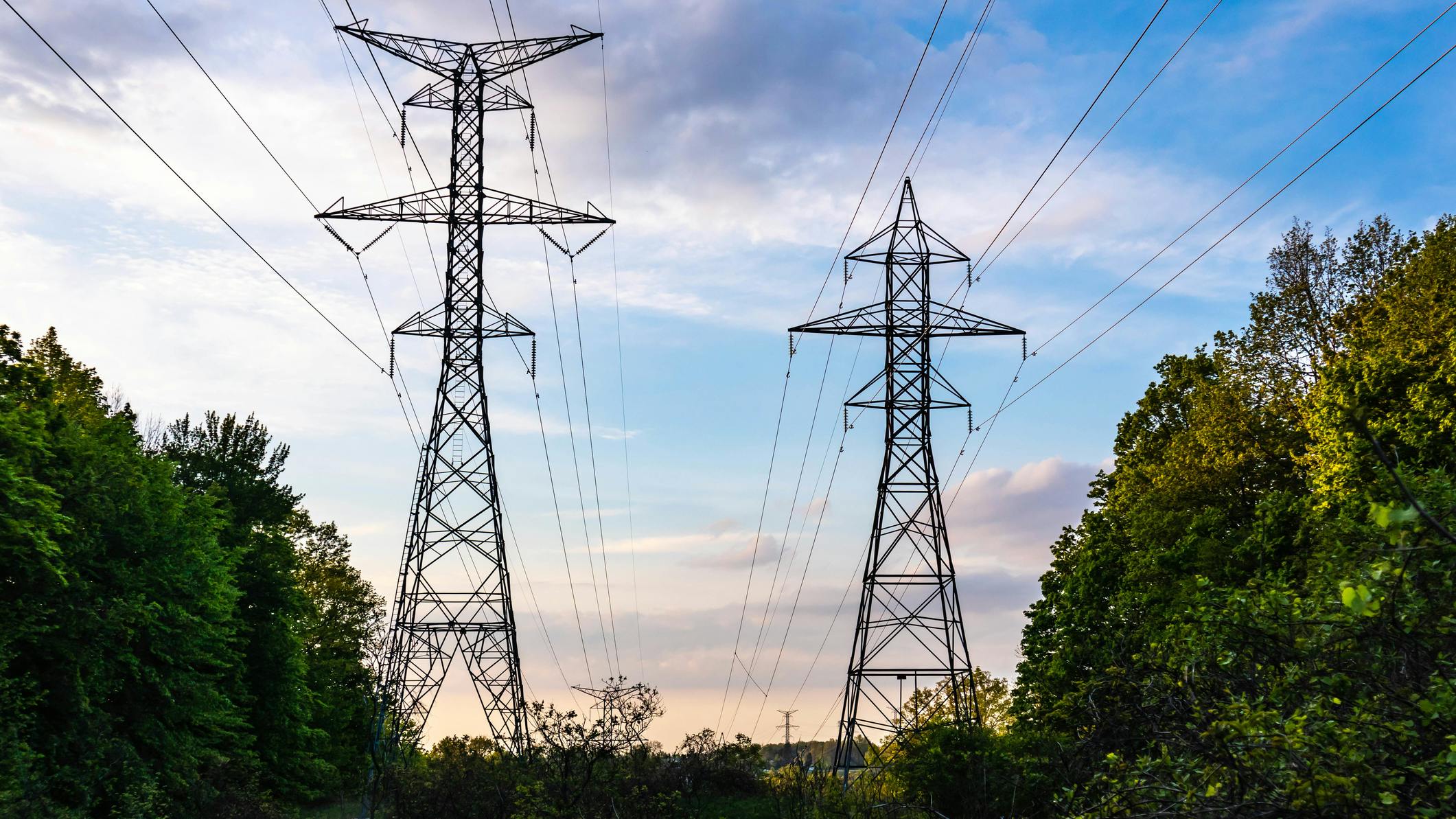 A low angle shot of the High voltage transmission line Ontario, Canada