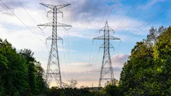 A low angle shot of the High voltage transmission line Ontario, Canada A low angle shot of the High voltage transmission line Ontario, Canada