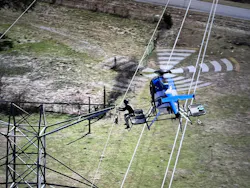 Helicopters perform various construction and maintenance activities within shielded areas. Helicopters perform various construction and maintenance activities within shielded areas.