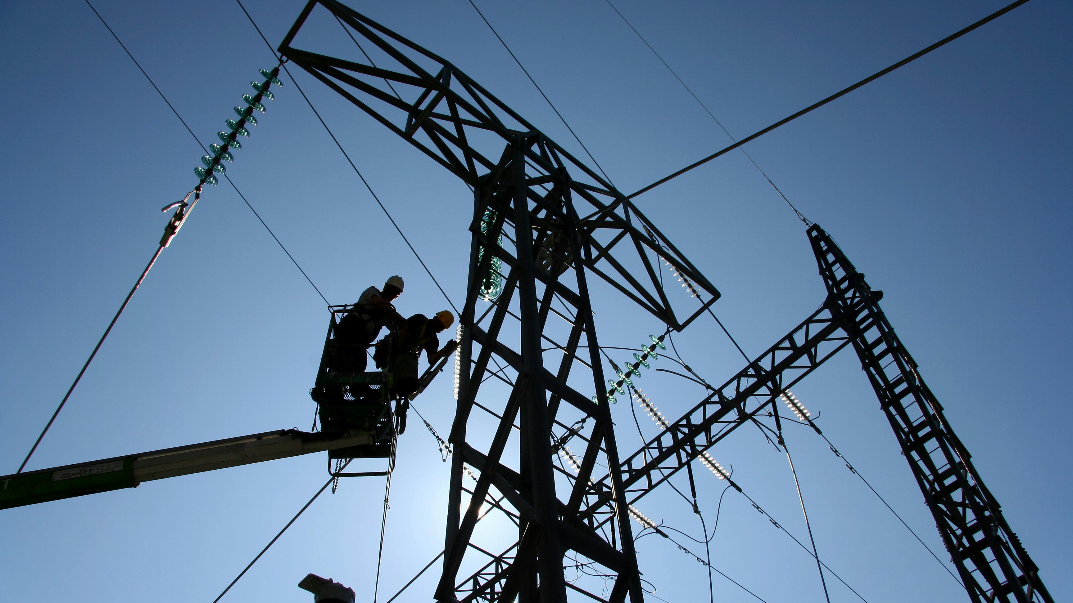 power towers with workers