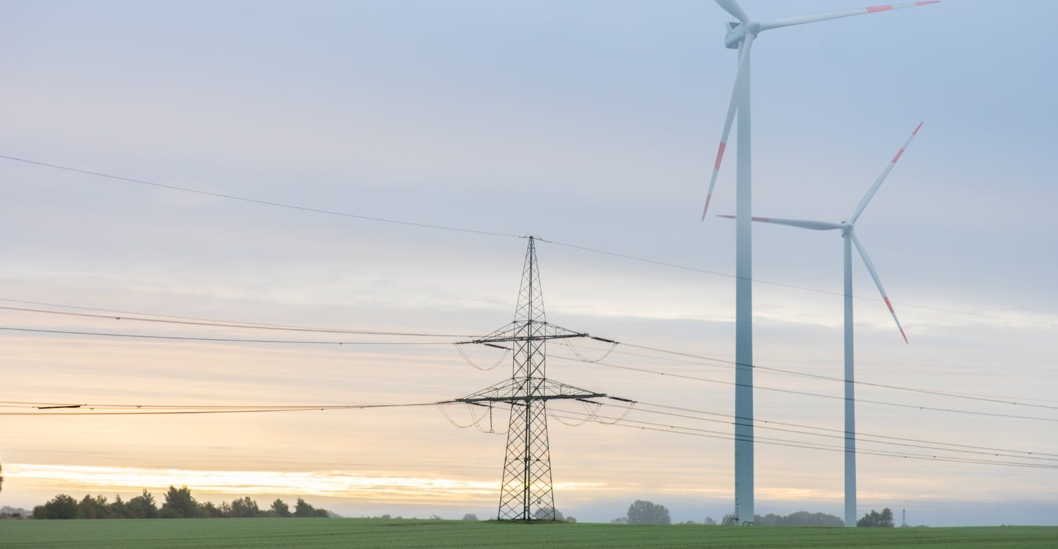 69c59ff97148b990074b1119 Wind Turbines And Power Lines 1540x800