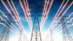 Electricity transmission towers with red glowing wires Electricity transmission towers with red glowing wires