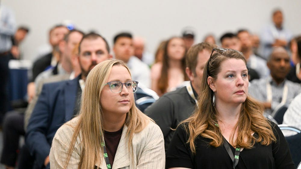 women sitting in conference