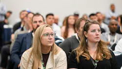 women sitting in conference women sitting in conference