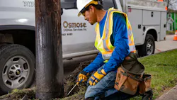 worker by pole worker by pole