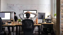 Female working from her home office staring at her computer screen. Female working from her home office staring at her computer screen.