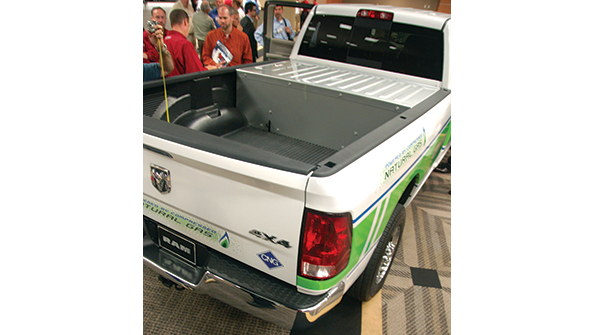 This Ram 4x4 pickup addresses the natural gas storage issue by putting a tank within a steel enclosure in the front of the pickup box