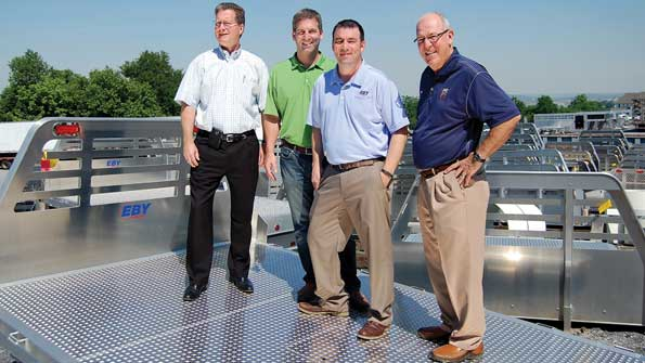 From left Charlie Horton Nick Eby Travis Eby and Menno Eby Jr have led the company into its new emphasis on truck bodies