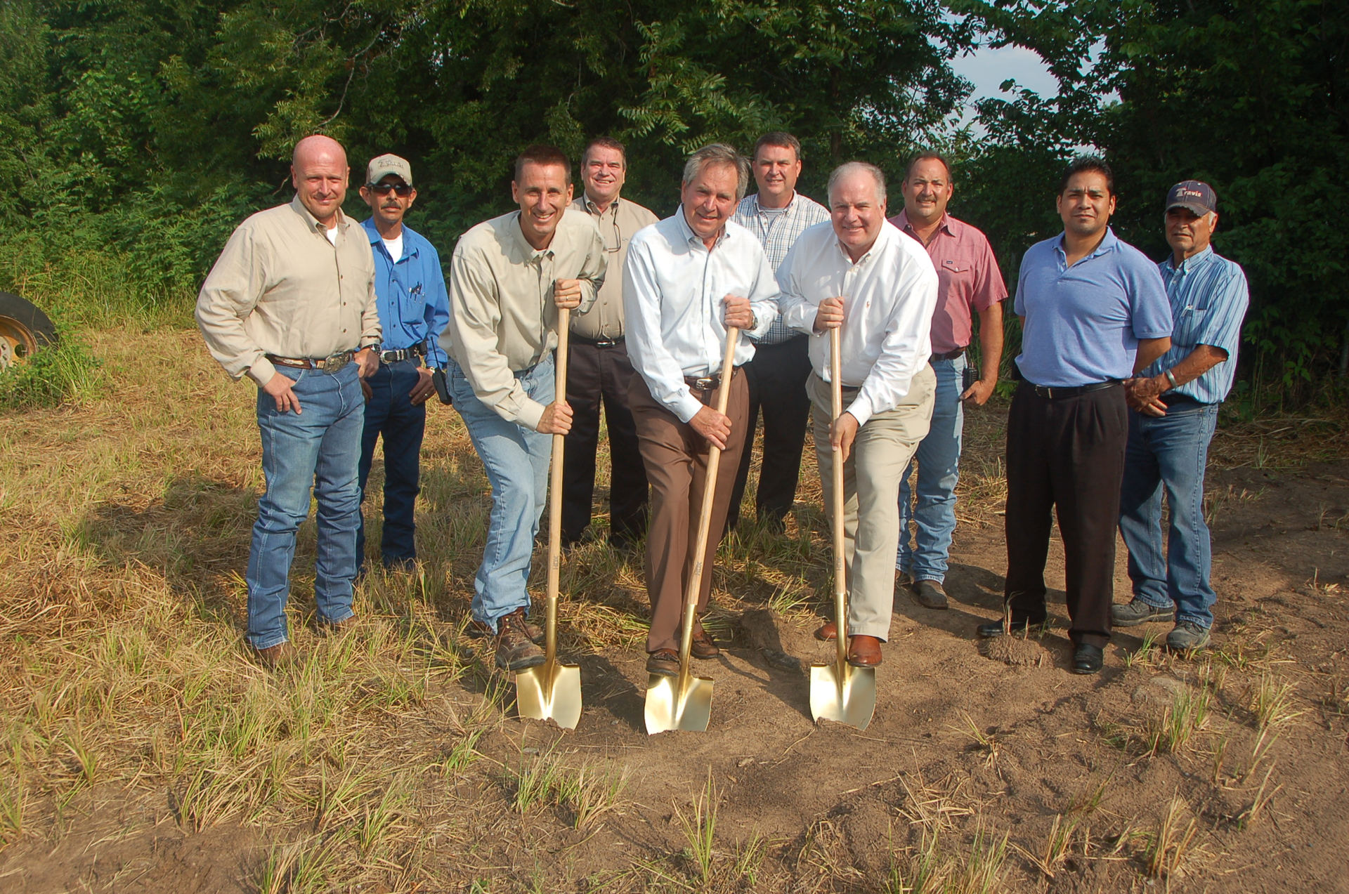 Breaking ground for the new Travis Body amp Trailer plant expansion are Jason Backs vicepresident of production C K Bud Hughes president and CEO and Doug Gwin CFO Also shown are Johnny Wilkerson Ricardo Pruneda Chris Wisnieski Troy Fischer Gerald Mullican Xavier Torres and Billy Martinez