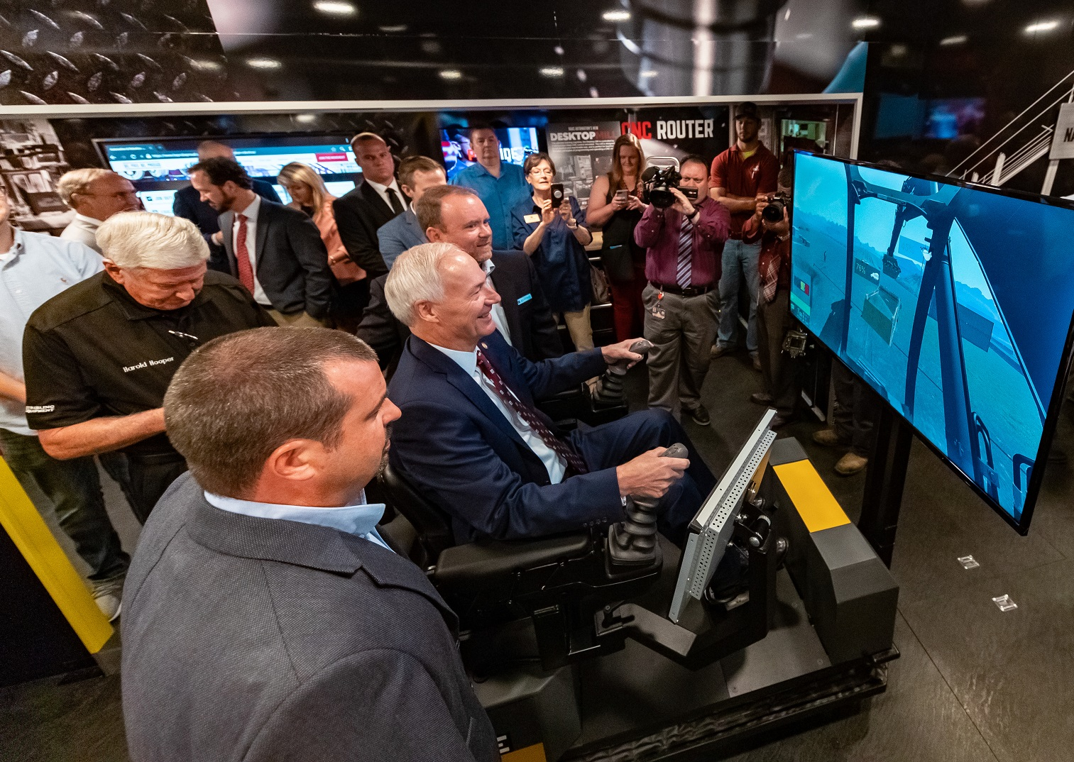 Arkansas Governor Hutchinson, Heavy Equipment Simulator1.jpg