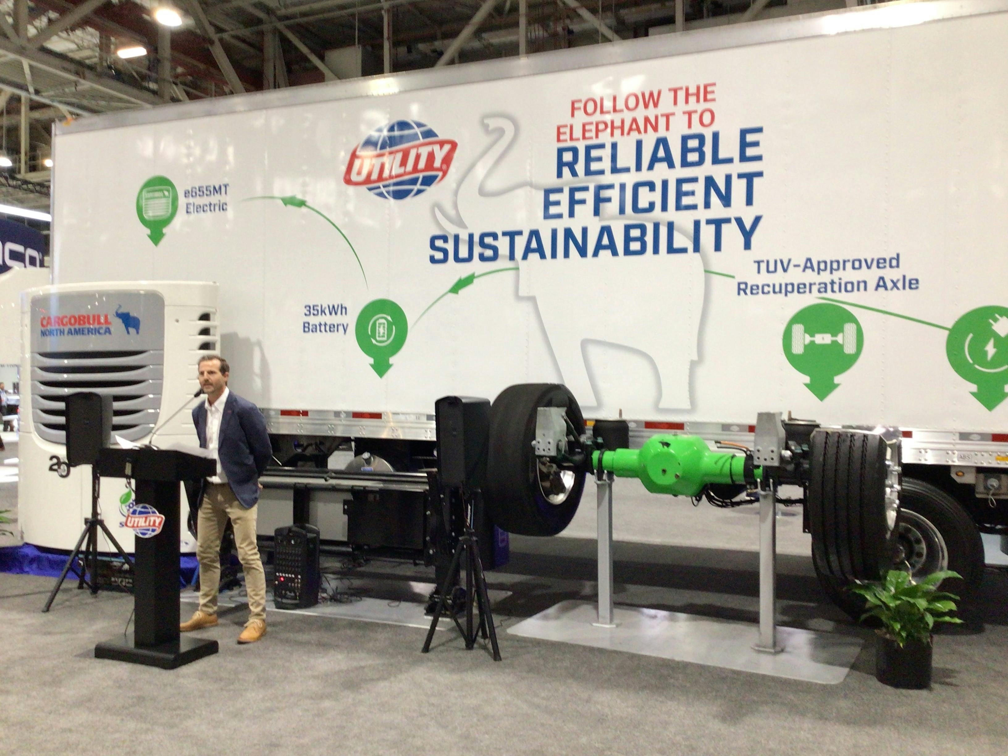 Utility Trailer VP Andrew Bennett showcasing the new Cargobull hybrid units at TMC.