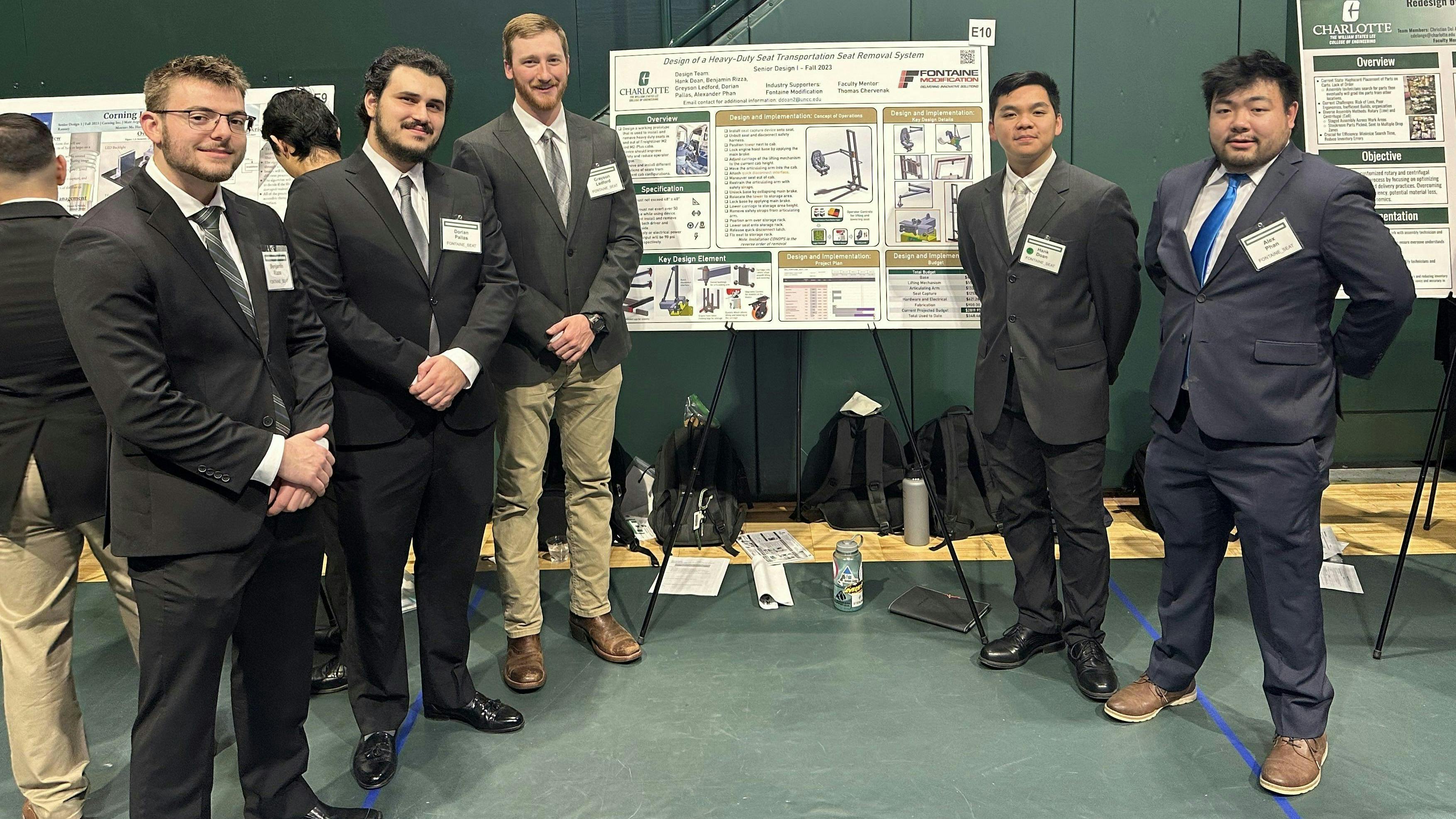 The University of North Carolina at Charlotte Senior Design Expo showcases the innovative and creative design solutions developed by senior engineering students throughout the year, including this team that is working with Fontaine Modification to develop a device that will more efficiently remove seats from trucks being modified into car carriers. Shown from left to right are UNCC Seniors Benjamin Rizza, Dorian Pallas, Grayson Ledford, Hank Doan and Alex Phan.