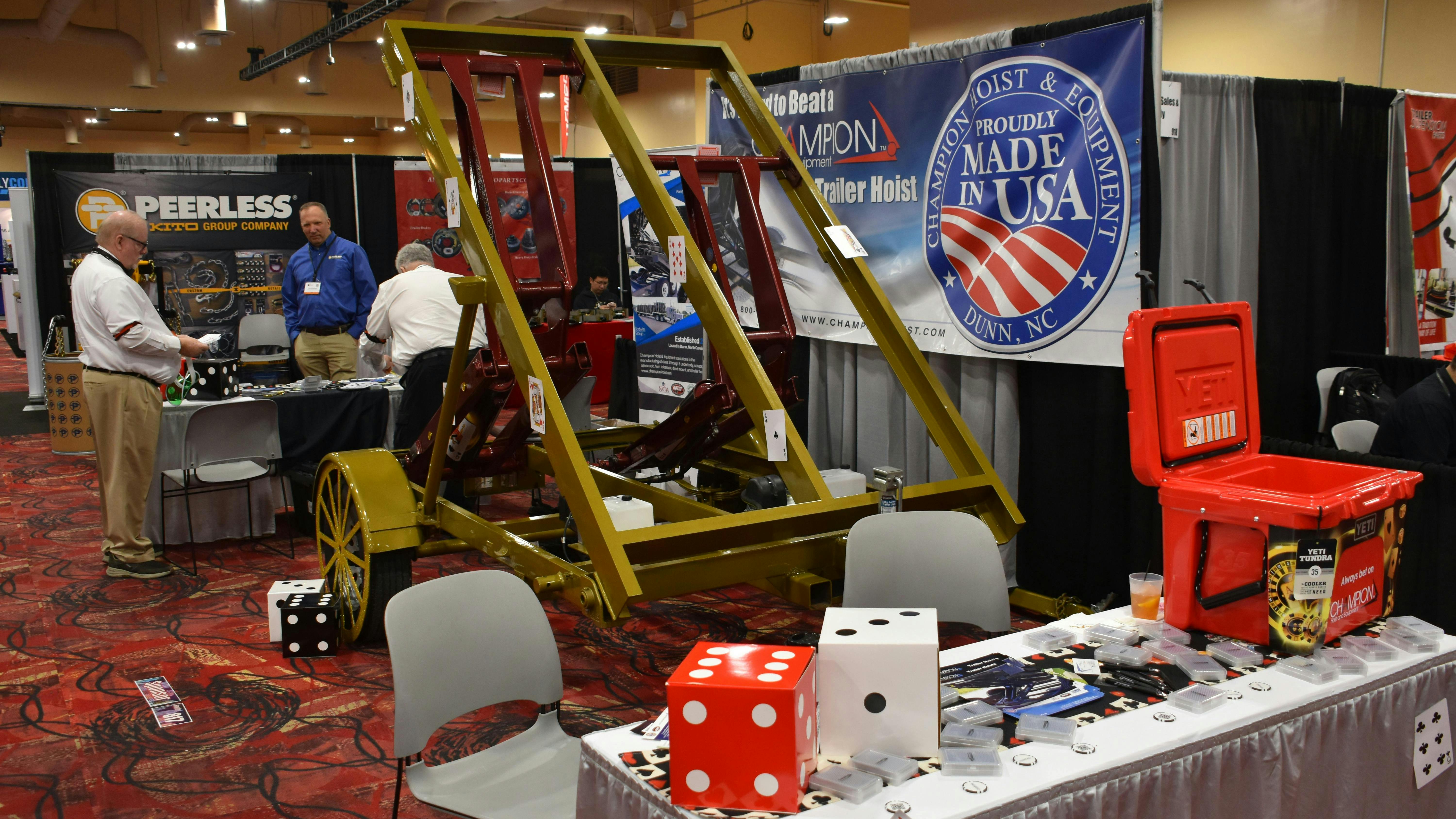 The NATM trade show floor featured 230 exhibiting companies with 321 booths this year. Shown here, the Vegas-themed Champion Hoist & Equipment booth.