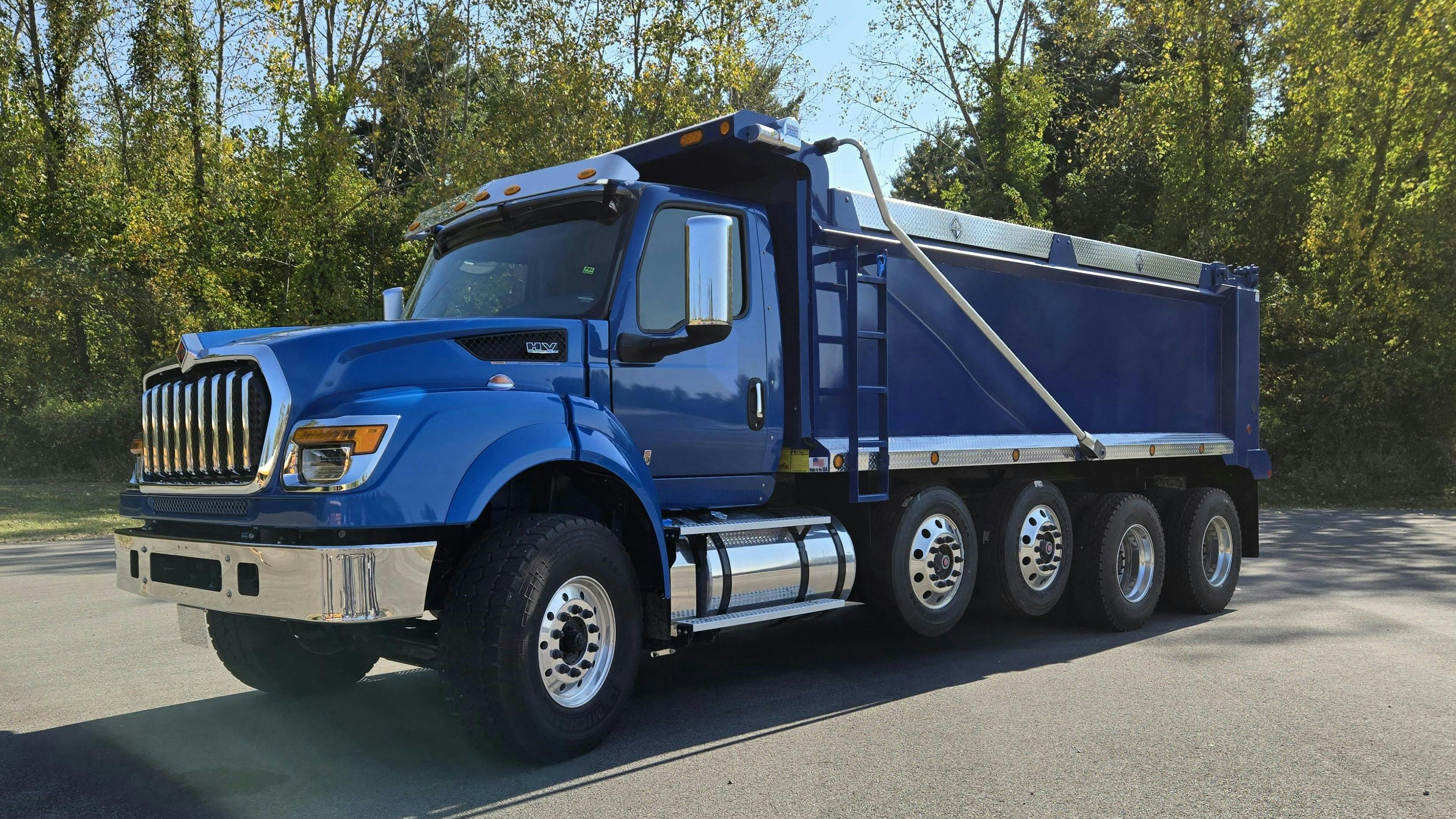 The HV Series integration updates include factory installed PTOs, enhanced Diamond Logic electronics, increased ground clearance, new tag and pusher options, and standardized fuel water and air dryer locations.