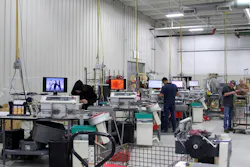 Workers stay busy assembling harnesses in Peterson’s wiring harness facility. Workers stay busy assembling harnesses in Peterson’s wiring harness facility.