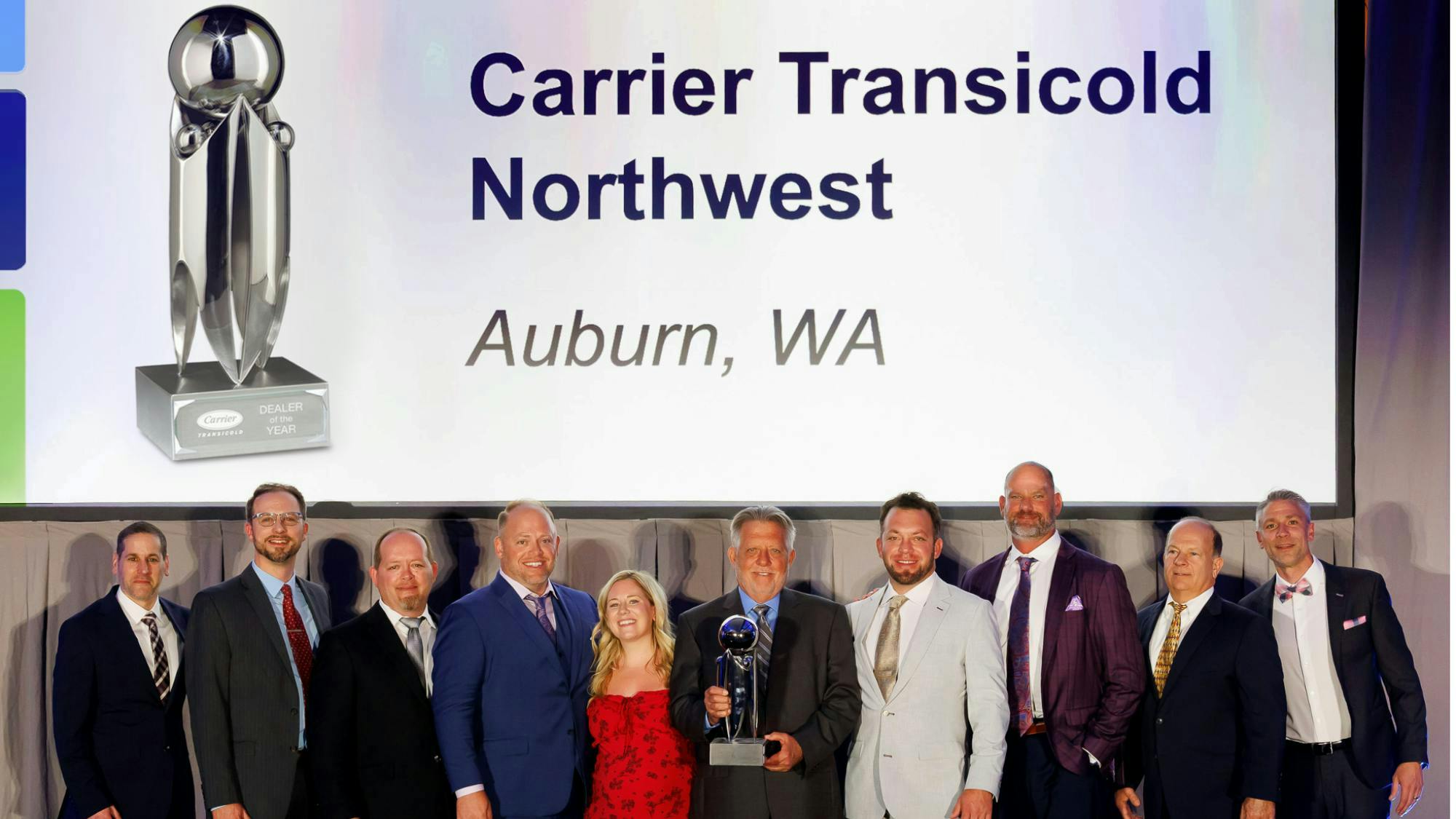Carrier Transicold named Carrier Transicold Northwest, a Northwest Equipment Group company, its 2025 Dealer of the Year. Pictured left to right: Jason Forman, General Manager, Original Equipment-Truck Trailer Americas, Carrier Transicold; Travis Mayhew, Network Development Manager, Carrier Transicold; Brian Kolar, President, Northwest Equipment Group; Aaron Kolar, Chief Operating Officer, Northwest Equipment Group; Sammi Sogura, General Sales Manager, Northwest Equipment Group; Mike Kolar, Chief Executive Officer, Northwest Equipment Group; Brandon Kolar, EVP-Fixed Operations, Northwest Equipment Group; Ryan Morrow, EVP- Sales & Operations, Northwest Equipment Group; Mike Murdock, Western U.S. & Canadian Region Director, Carrier Transicold; Sam Roach, Director of Sales, Carrier Transicold.