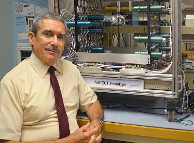 James Ryan beside the Portable Neutron Spectroscope (NSPECT). The instrument was conceived, designed, and tested to image and measure sources of neutron radiation. Photo by Kristi Donahue, UNH-EOS