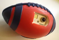Researchers from Carnegie Mellon University and the University of Electro-Communications have shown that a camera embedded in the side of a rubber-sheathed plastic foam football can record video while the ball is in flight, along with developing a computer algorithm that converts the raw video into a stable, wide-angle view. Researchers from Carnegie Mellon University and the University of Electro-Communications have shown that a camera embedded in the side of a rubber-sheathed plastic foam football can record video while the ball is in flight, along with developing a computer algorithm that converts the raw video into a stable, wide-angle view.