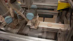 Figure 1: A Cognex DS1101 3D laser profiler inspects metal pans called godets that are filled with powdered cosmetics products. Figure 1: A Cognex DS1101 3D laser profiler inspects metal pans called godets that are filled with powdered cosmetics products.