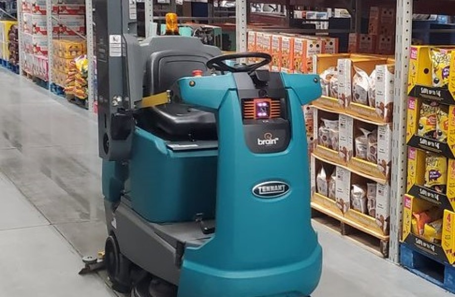 The autonomous robot scrubs floors and scans inventory at Sam's Club.