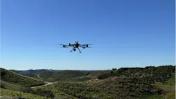 A drone equipped with the Q.Fly Water system in flight. A drone equipped with the Q.Fly Water system in flight.