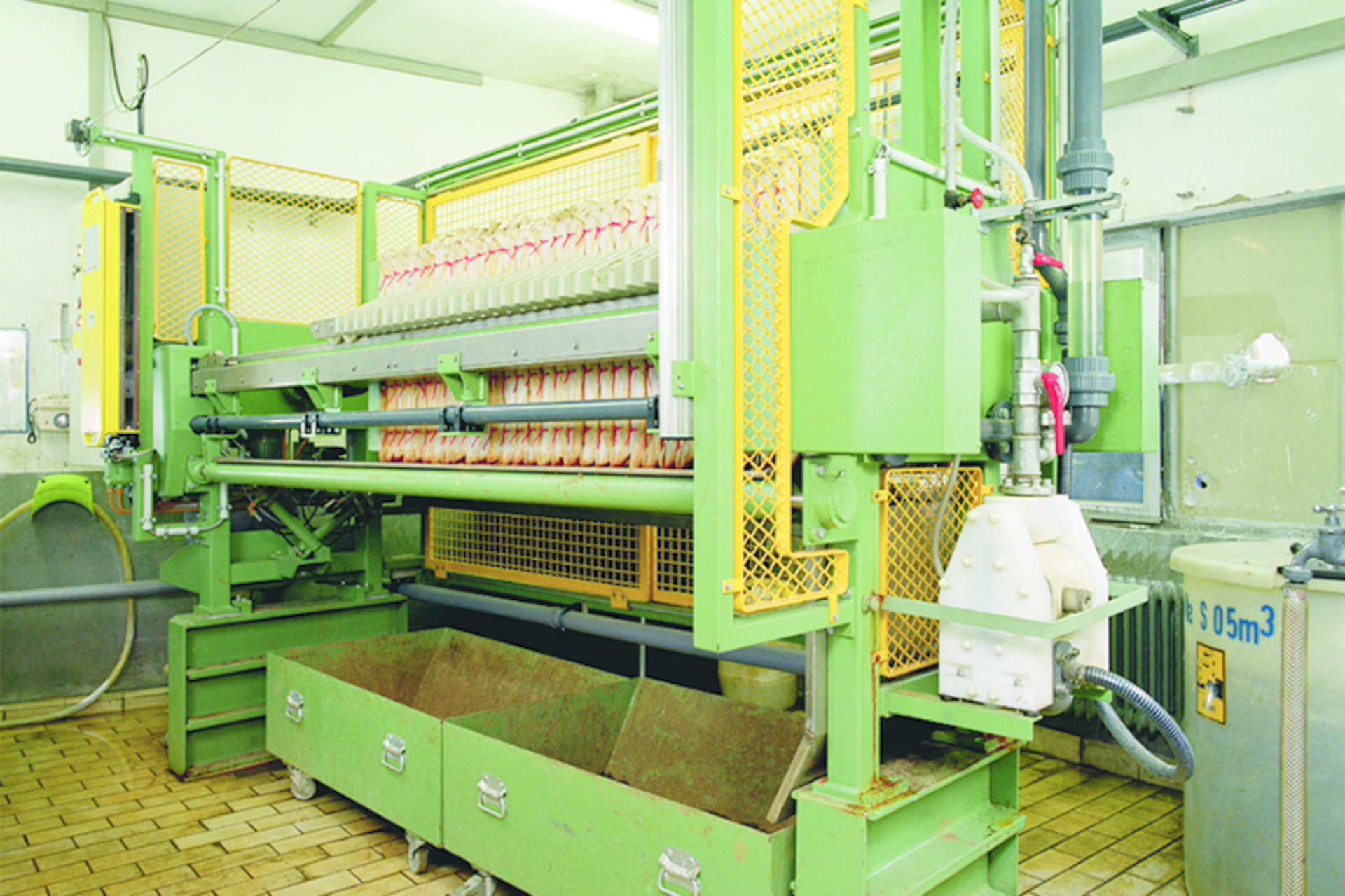 Figure 1. A typical chamber filter press fed by an Almatec high-pressure AODD pump. All graphics courtesy of Almatec