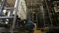 A Wrangler® engineer checks the reverse osmosis filtration system, an important step in the wastewater cleaning process. A Wrangler® engineer checks the reverse osmosis filtration system, an important step in the wastewater cleaning process.