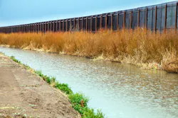 The US border fence to Mexico at El Paso. The US border fence to Mexico at El Paso.