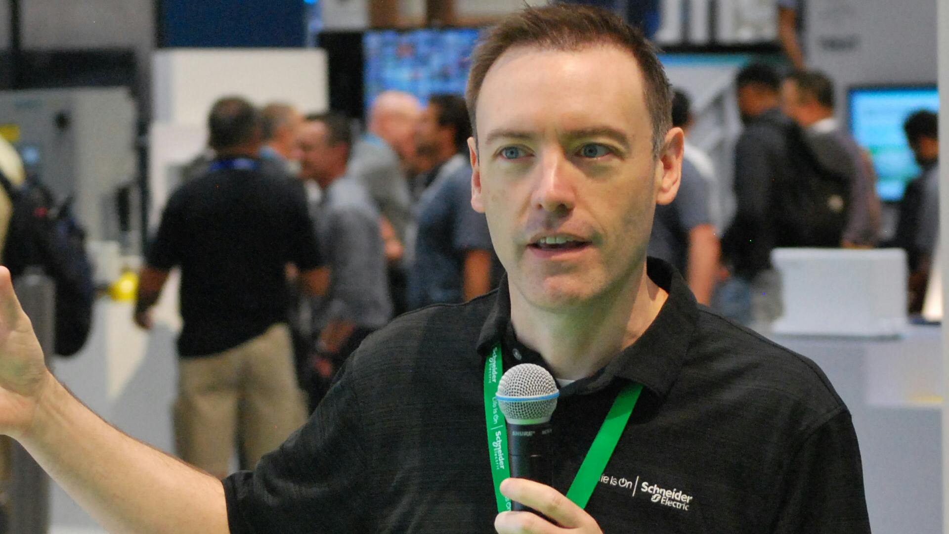 Eric Barnes discusses Schneider Electric's TeSys motor control device during a presentation at the company's booth on Tuesday at WEFTEC 2024.