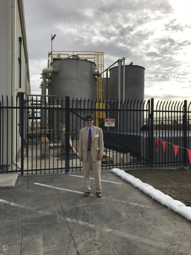 Envirogen's Dr. Todd Webster in front of the newly started up Fluidized Bed Reactor system. (PRNewsFoto/Envirogen Technologies, Inc.)