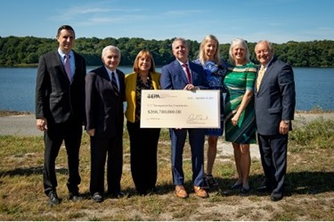 Left to right: Rhode Island General Treasurer Seth Magaziner, U.S. Senator Jack Reed, NBC Executive Director Laurie Horridge , EPA Region 1 Administrator Dennis Deziel, NBC CFO Karen Giebink, Director RI Department of Environmental Management Janet Coit, NBC Chairman Vincent Mesolella; Photo Credit: Peter Goldberg for the Narragansett Bay Commission.