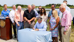 Governor John Carney signing the Clean Water for Delaware Act at a public event on July 22. Governor John Carney signing the Clean Water for Delaware Act at a public event on July 22.