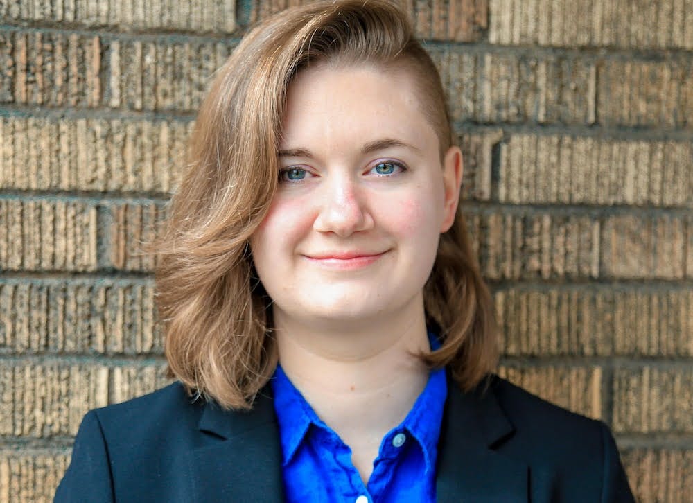 65e74b2ca9f492001e1c0c80 Aly Headshot