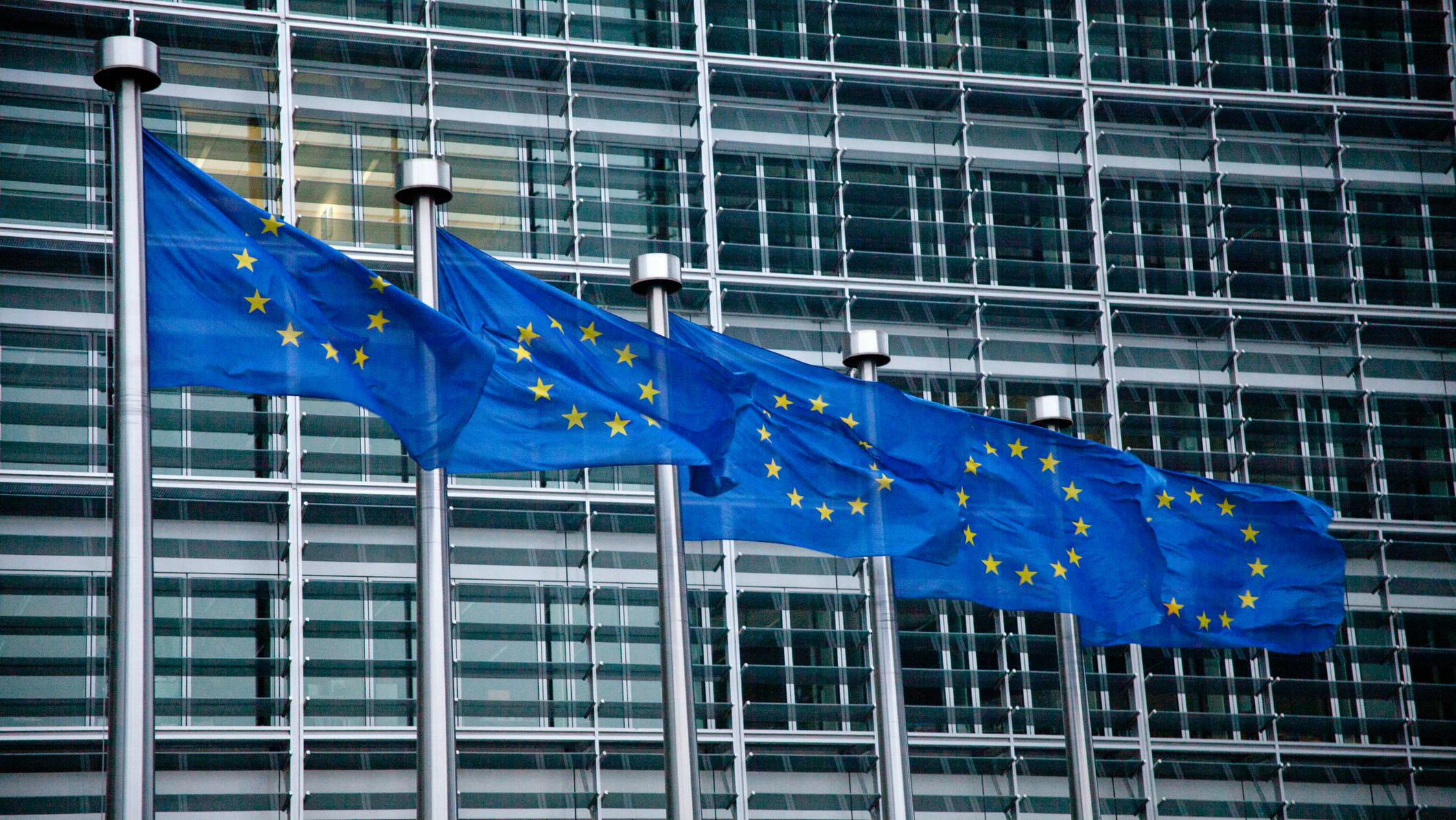 European Union flags at the European Commission building in Brussels, Belgium