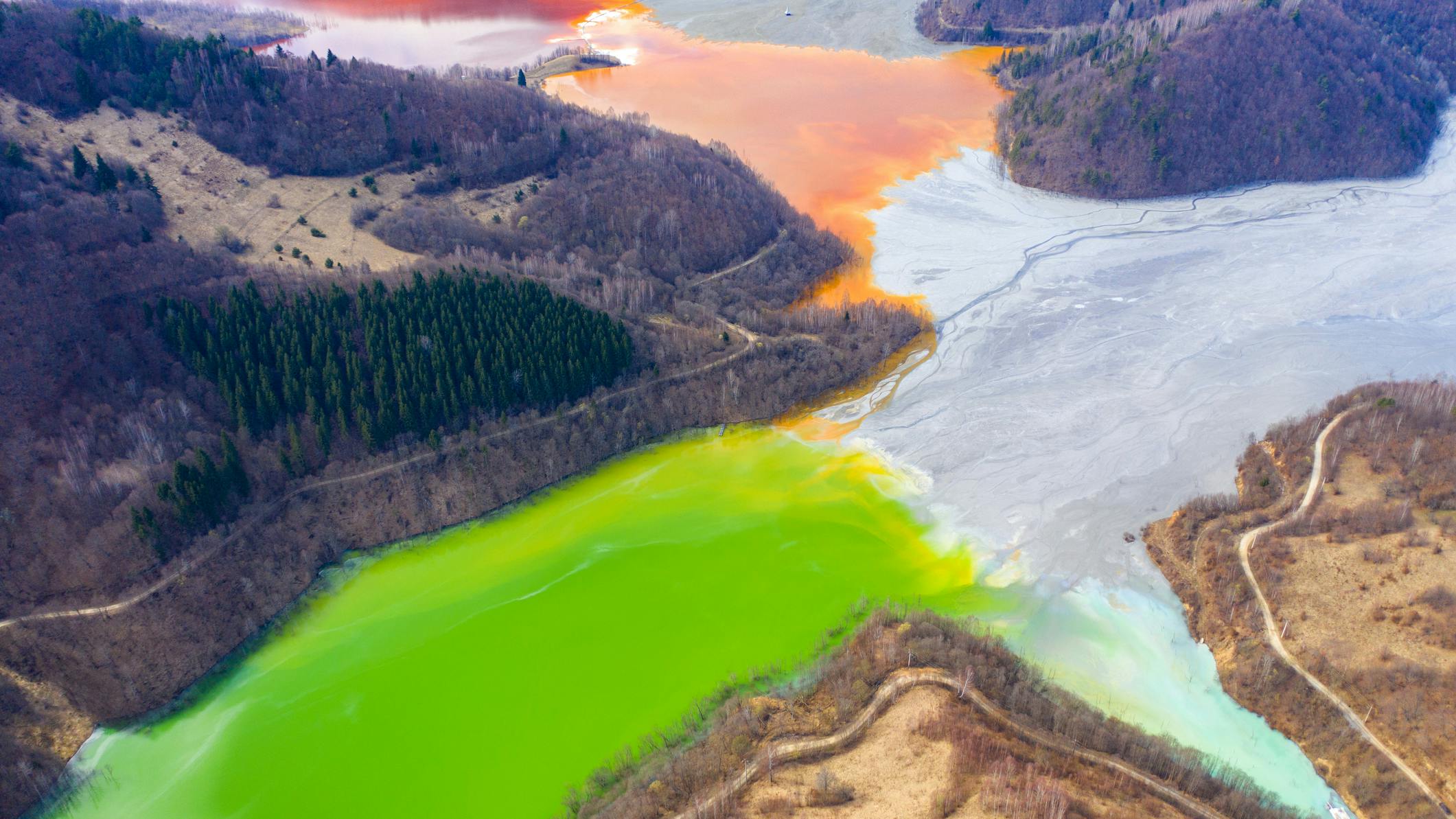 Aerial view of a lake filled with chemical waste water