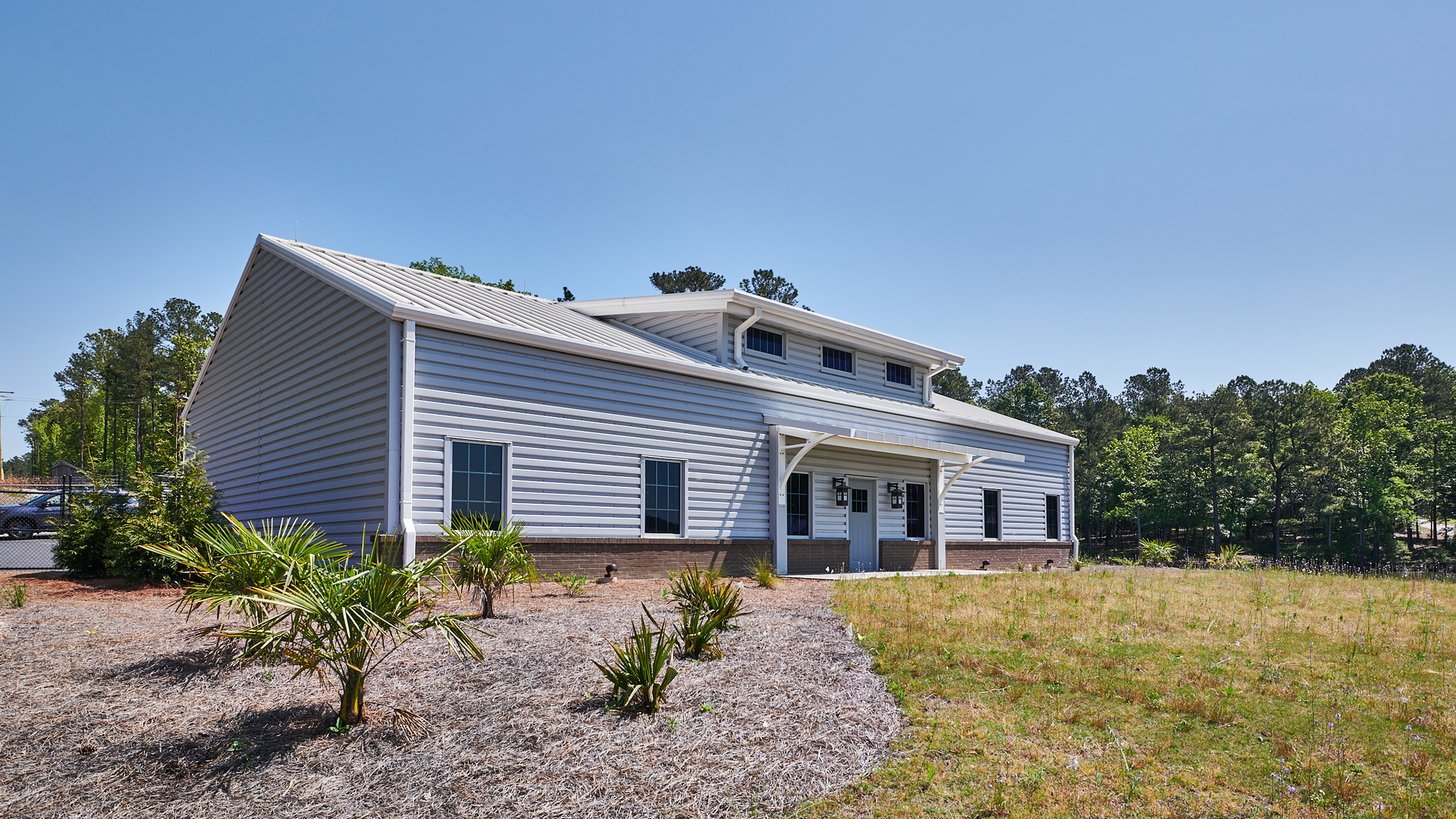 With its location on the bank of Lake Greenwood, designers developed architecture to make the raw water intake look like another house in the lake-side community.
