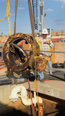 An old valve is removed during the construction of the Pyramid Peak Water Treatment Plant. An old valve is removed during the construction of the Pyramid Peak Water Treatment Plant.